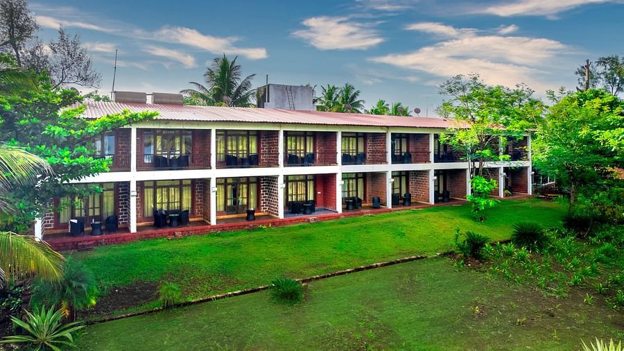 Lotus eco beach resort facade with garden in front